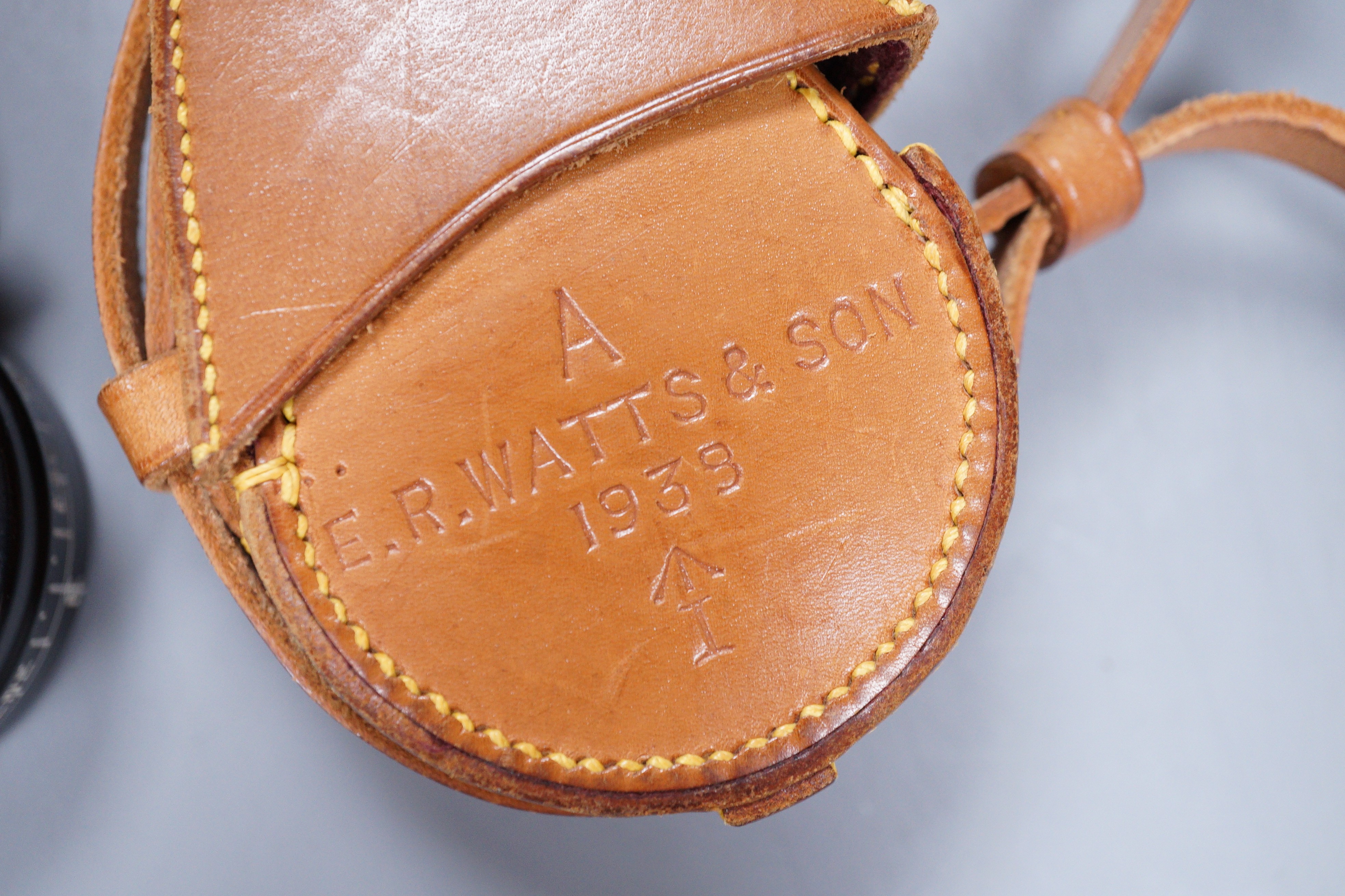 An E.R Watts and Son military compass, 1939 No 3233 MKIII in a leather case